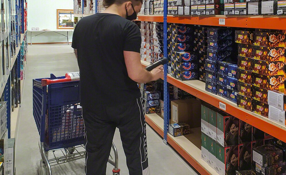 A Global Freaks operator goes through the warehouse, preparing orders